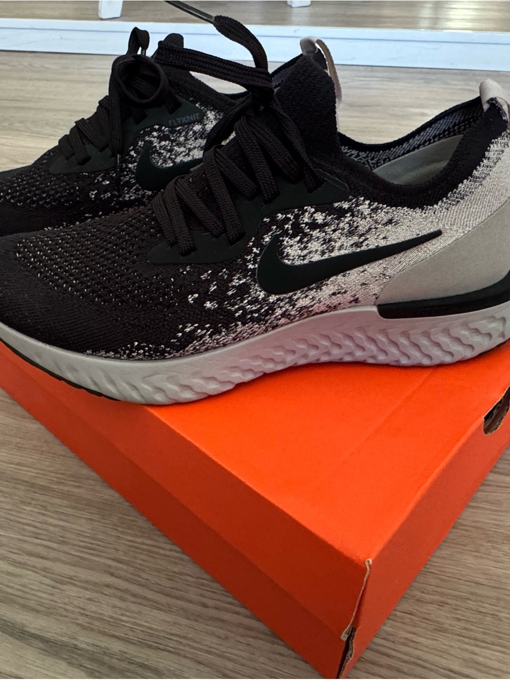 Nike Women’s Black and Gray Knit Sneakers